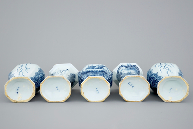 A 5-piece blue and white Dutch Delft garniture with landscape design, 18th C.